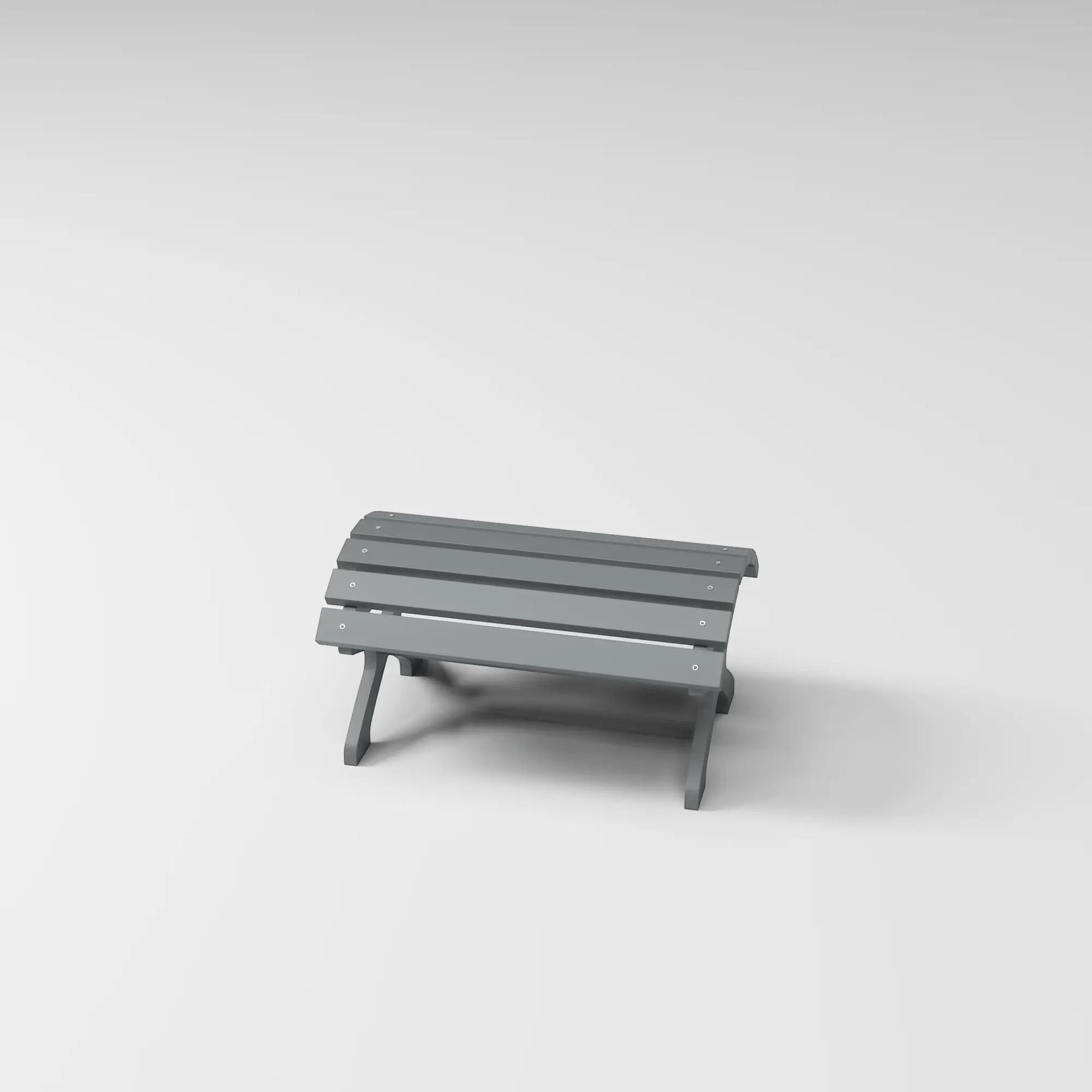 RVO Products grey HDPE plastic classic footstool with slatted top, designed to match Muskoka chairs for outdoor comfort.
